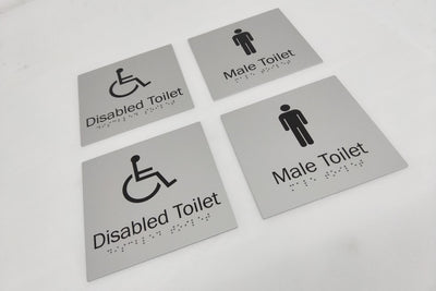 aluminum painted male toilet sign